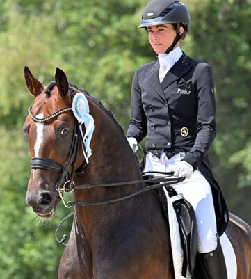 Lisa Muller riding a horse. 